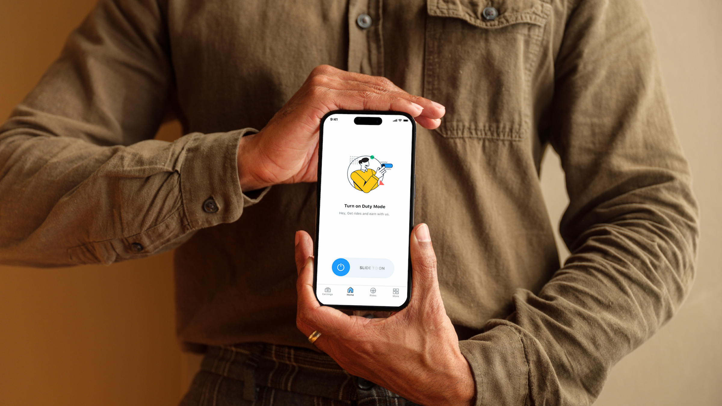 DriverIn app — duty mode screen held in hand